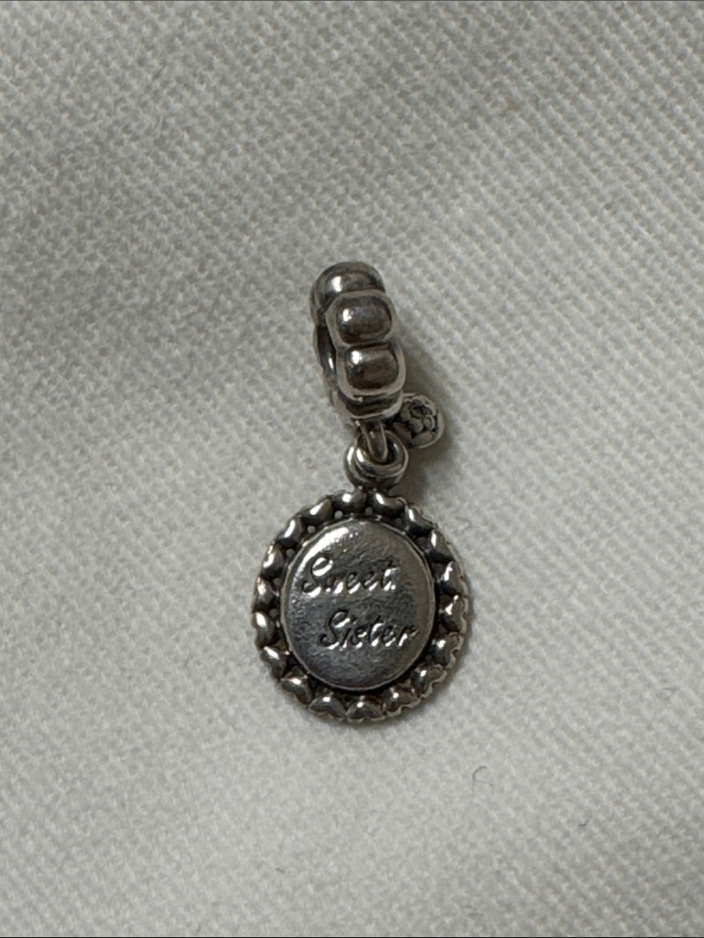 Pandora “sweet sister” charm